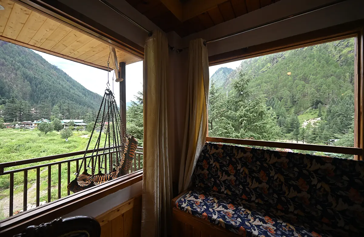 view-and-seating-area-from-luxury-room-in-hillside-kasol